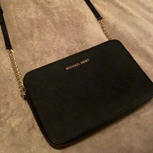 Black leather Michael Kors crossbody bag